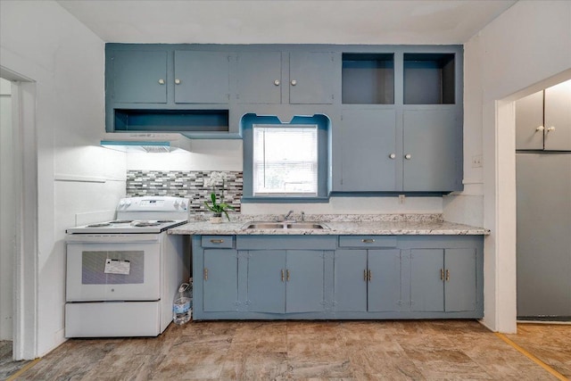 513 San Marcos Hwy, Luling, TX 78648 - kitchen featuring white electric stove, decorative backsplash, blue cabinets, and extractor fan