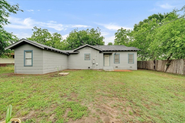 back of property featuring crawl space