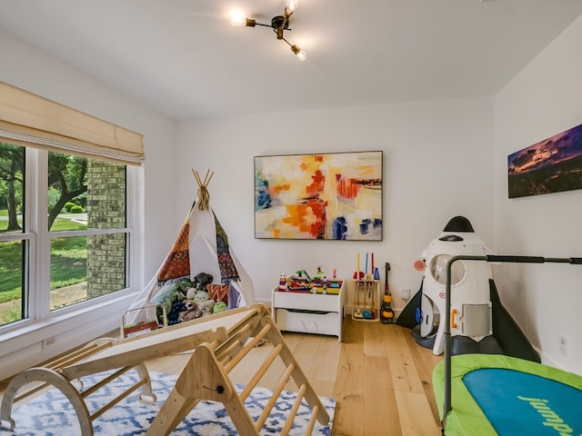 6802 Rio Bravo Ln, Austin, TX 78737 - game room featuring light wood-style floors and healthy amount of natural light
