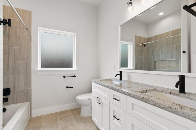 20405 Sunset Strip St, Lago Vista, TX 78645 - bathroom with double vanity, tiled shower / bath, and tile patterned flooring