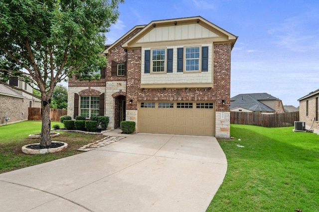 2020 Elaina Loop, Leander, TX 78641 - traditional home with cooling unit, an attached garage, concrete driveway, and stone siding