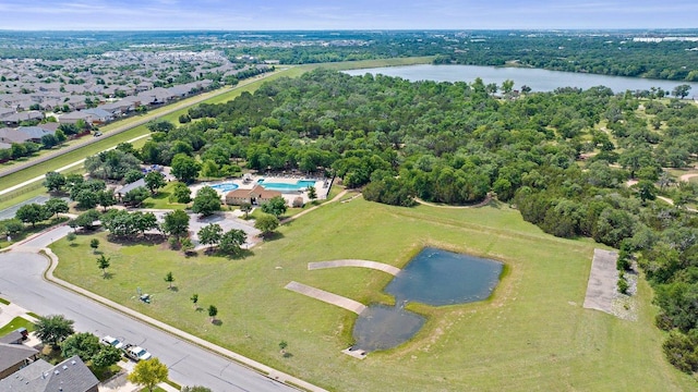 2020 Elaina Loop, Leander, TX 78641 - aerial view of property and surrounding area with a nearby body of water and a pool area