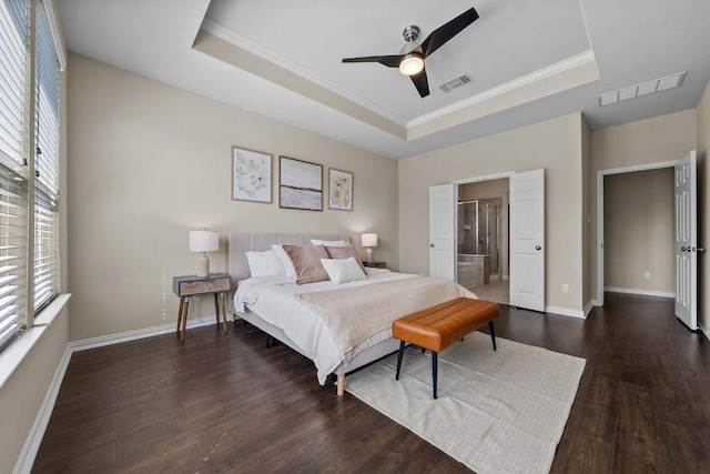 2020 Elaina Loop, Leander, TX 78641 - bedroom featuring a tray ceiling, wood finished floors, baseboards, and ornamental molding