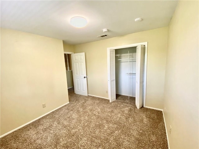 8502 Woodstone Dr, Austin, TX 78757 - unfurnished bedroom featuring carpet floors, baseboards, and a closet