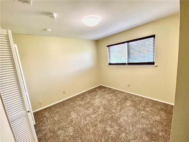 8502 Woodstone Dr, Austin, TX 78757 - unfurnished bedroom featuring carpet floors and baseboards