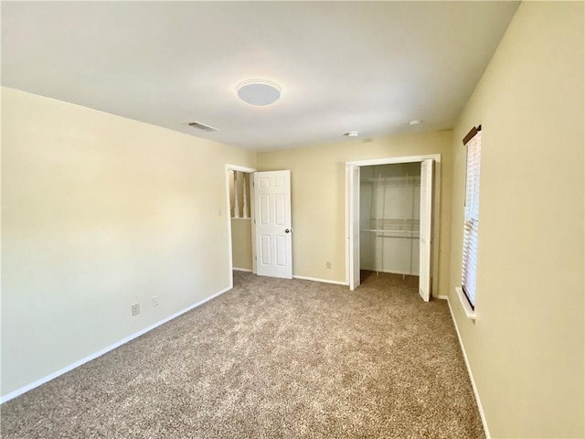 8502 Woodstone Dr, Austin, TX 78757 - unfurnished bedroom featuring carpet floors, a closet, and baseboards