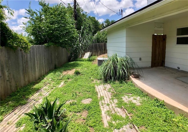 8502 Woodstone Dr, Austin, TX 78757 - view of yard with fence and central AC unit