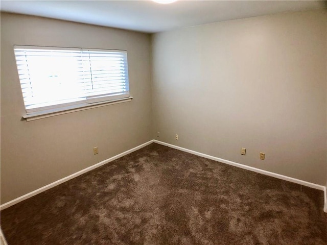8502 Woodstone Dr, Austin, TX 78757 - carpeted spare room with baseboards