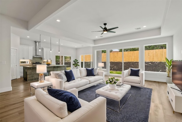8800 Bar K Ranch Rd, Lago Vista, TX 78645 - living room with plenty of natural light, ceiling fan, recessed lighting, and light wood-style floors