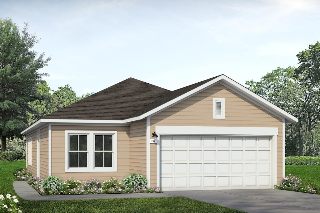 view of front facade featuring concrete driveway, a shingled roof, and an attached garage
