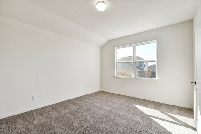 1174 Amy Dr, Kyle, TX 78640 - bonus room featuring carpet floors, vaulted ceiling, and baseboards