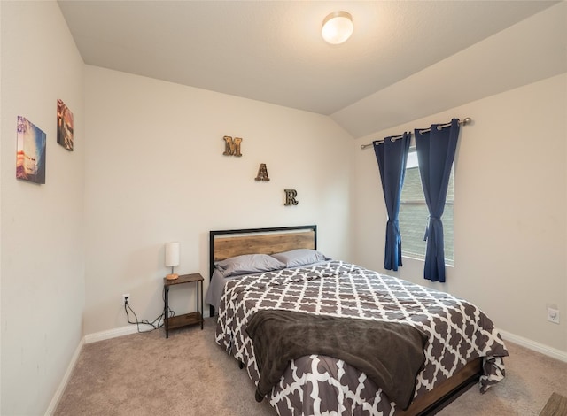 111 Lyrebird Ln, Hutto, TX 78634 - carpeted bedroom with baseboards and vaulted ceiling