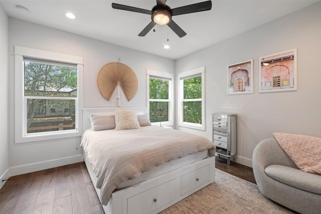 4423 Jinx Ave Unit 2, Austin, TX 78745 - bedroom featuring multiple windows, wood finished floors, recessed lighting, and ceiling fan