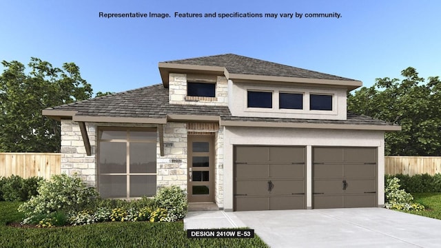view of front of property with fence, stone siding, and concrete driveway