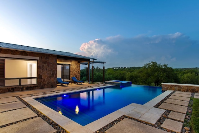 9208 Madrone Ranch Trl, Austin, TX 78738 - view of swimming pool with a patio area and a pool with connected hot tub