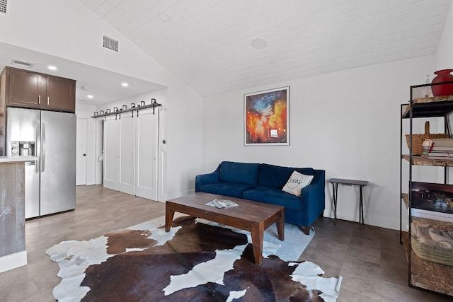 living room with lofted ceiling, baseboards, and recessed lighting