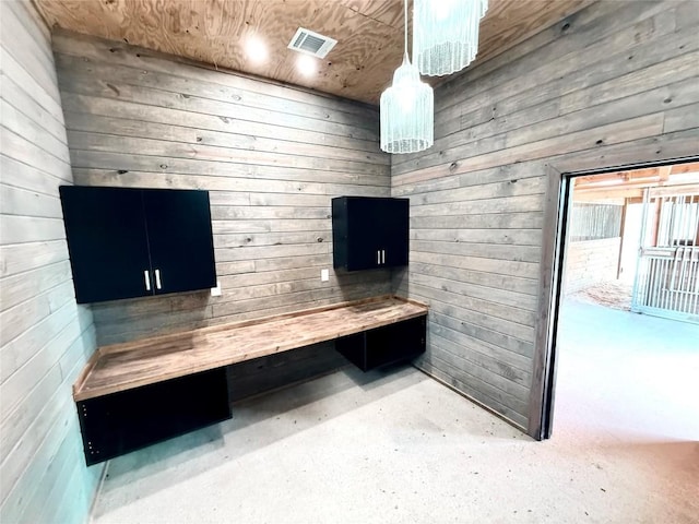 9208 Madrone Ranch Trl, Austin, TX 78738 - miscellaneous room featuring wood walls