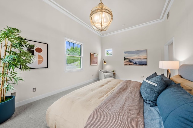 512 E 49th St, Austin, TX 78751 - bedroom with crown molding, carpet floors, and a chandelier