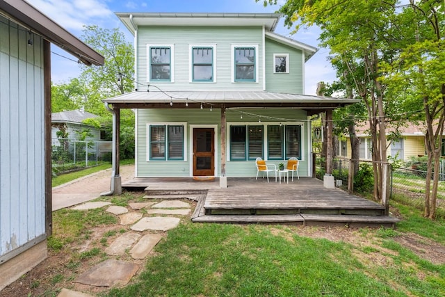 512 E 49th St, Austin, TX 78751 - view of front facade featuring a metal roof and a wooden deck