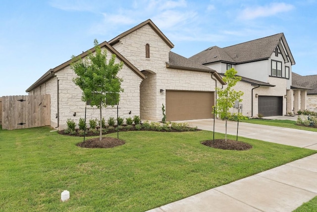 french country inspired facade featuring stone siding, concrete driveway, a garage, and a shingled roof