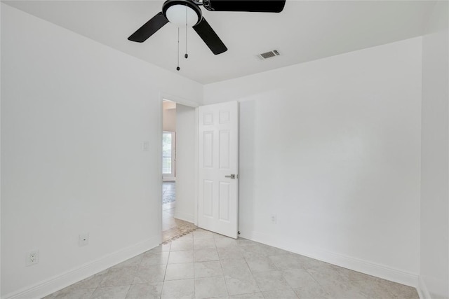 4703 Quicksilver Blvd, Austin, TX 78744 - empty room featuring a ceiling fan and baseboards