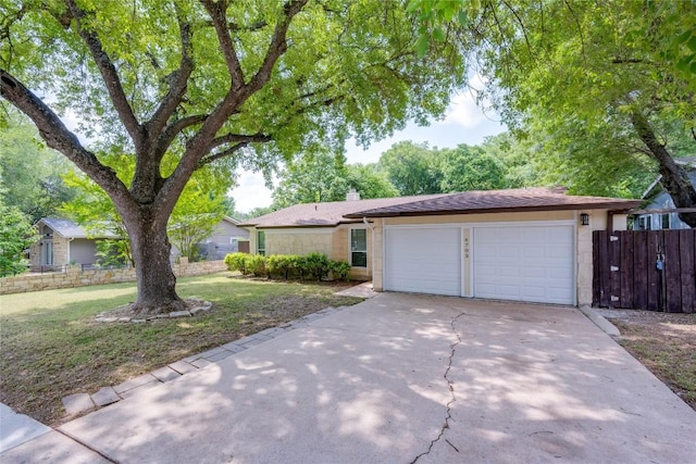 4703 Quicksilver Blvd, Austin, TX 78744 - ranch-style home featuring concrete driveway, a garage, and a chimney