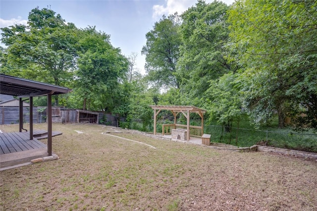 4703 Quicksilver Blvd, Austin, TX 78744 - fenced backyard featuring a pergola and a wooden deck