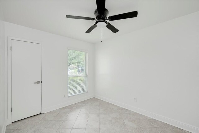 4703 Quicksilver Blvd, Austin, TX 78744 - empty room featuring baseboards and ceiling fan