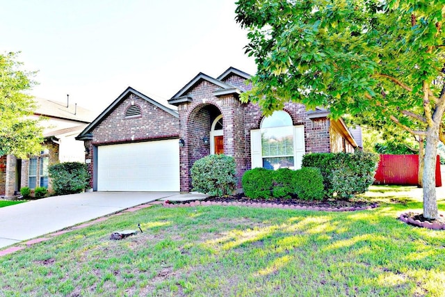 11120 Old Quarry Rd, Austin, TX 78717 - view of front of property with brick siding, an attached garage, and driveway