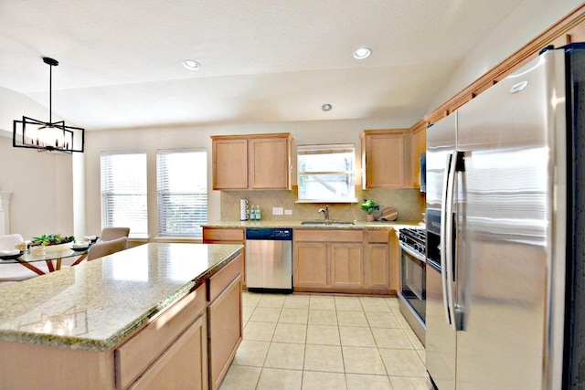11120 Old Quarry Rd, Austin, TX 78717 - kitchen featuring stainless steel appliances, light tile patterned flooring, a sink, tasteful backsplash, and light stone counters