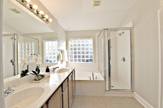 11120 Old Quarry Rd, Austin, TX 78717 - bathroom with a garden tub, a shower stall, double vanity, and tile patterned flooring