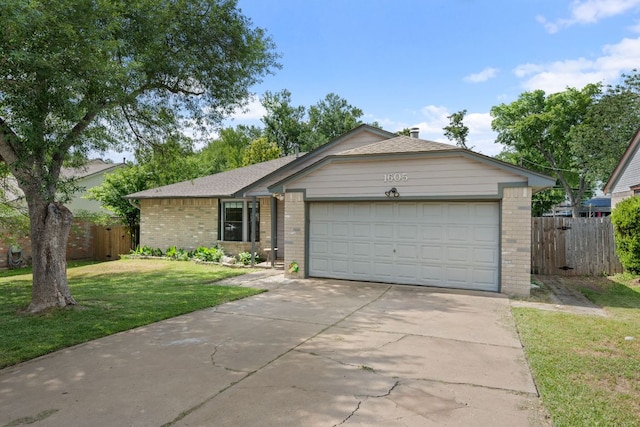 1605 Quail Run Rd, Pflugerville, TX 78660 - ranch-style house with brick siding, driveway, and an attached garage