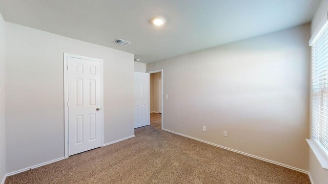 2402 Bee Creek Dr, Copperas Cove, TX 76522 - unfurnished bedroom featuring carpet flooring and baseboards