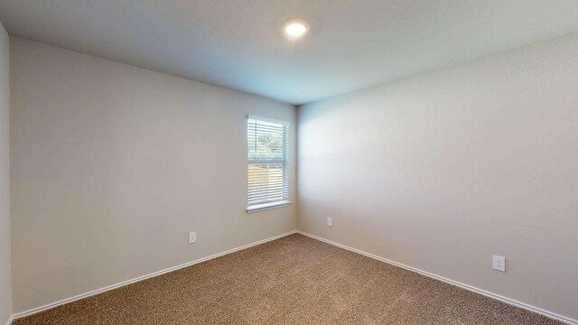 2402 Bee Creek Dr, Copperas Cove, TX 76522 - unfurnished room featuring carpet and baseboards