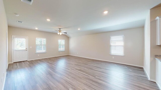 2402 Bee Creek Dr, Copperas Cove, TX 76522 - unfurnished living room with a ceiling fan, light wood finished floors, baseboards, and recessed lighting
