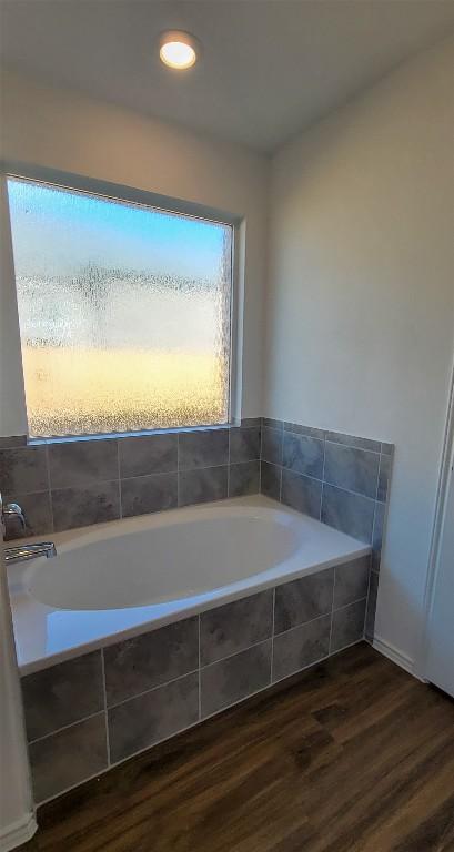 5605 Bellissima Way, Round Rock, TX 78665 - full bath featuring wood finished floors and a garden tub