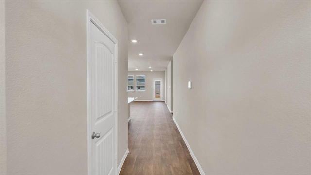 204 Inks Ln, Kyle, TX 78640 - corridor featuring dark wood-style flooring, baseboards, and recessed lighting