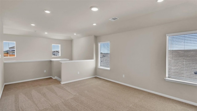 204 Inks Ln, Kyle, TX 78640 - empty room featuring carpet flooring, baseboards, and recessed lighting