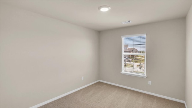204 Inks Ln, Kyle, TX 78640 - unfurnished room featuring baseboards and light colored carpet