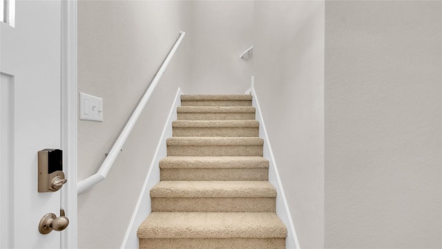 204 Inks Ln, Kyle, TX 78640 - stairs featuring carpet flooring
