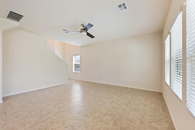 spare room featuring ceiling fan