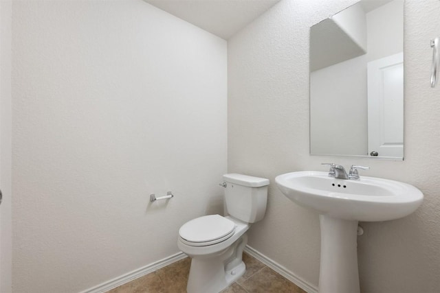 3548 Pauling Loop, Round Rock, TX 78665 - half bath with toilet and tile patterned floors