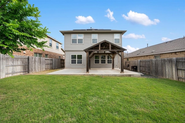 3548 Pauling Loop, Round Rock, TX 78665 - back of house with a patio, solar panels, and a fenced backyard