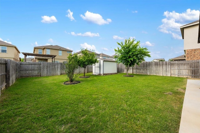 view of yard with a storage shed and an outbuilding