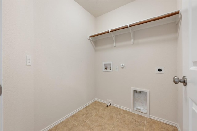 laundry room featuring gas dryer hookup, washer hookup, hookup for an electric dryer, and baseboards
