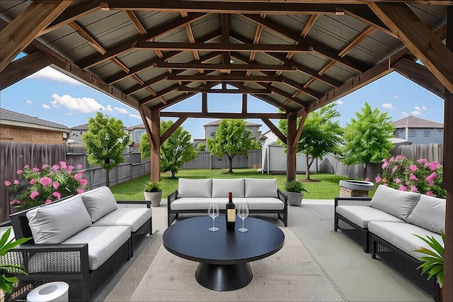 3548 Pauling Loop, Round Rock, TX 78665 - fenced backyard featuring outdoor lounge area, a patio area, a storage unit, and a gazebo