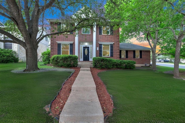 11110 Sierra Montana, Austin, TX 78759 - greek revival house with brick siding and a yard