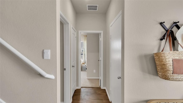 154 Sandringham Loop, Uhland, TX 78640 - hall featuring wood finished floors and baseboards