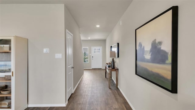 154 Sandringham Loop, Uhland, TX 78640 - corridor featuring wood finished floors, recessed lighting, and baseboards