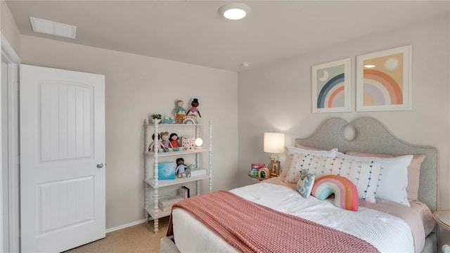 154 Sandringham Loop, Uhland, TX 78640 - carpeted bedroom featuring baseboards